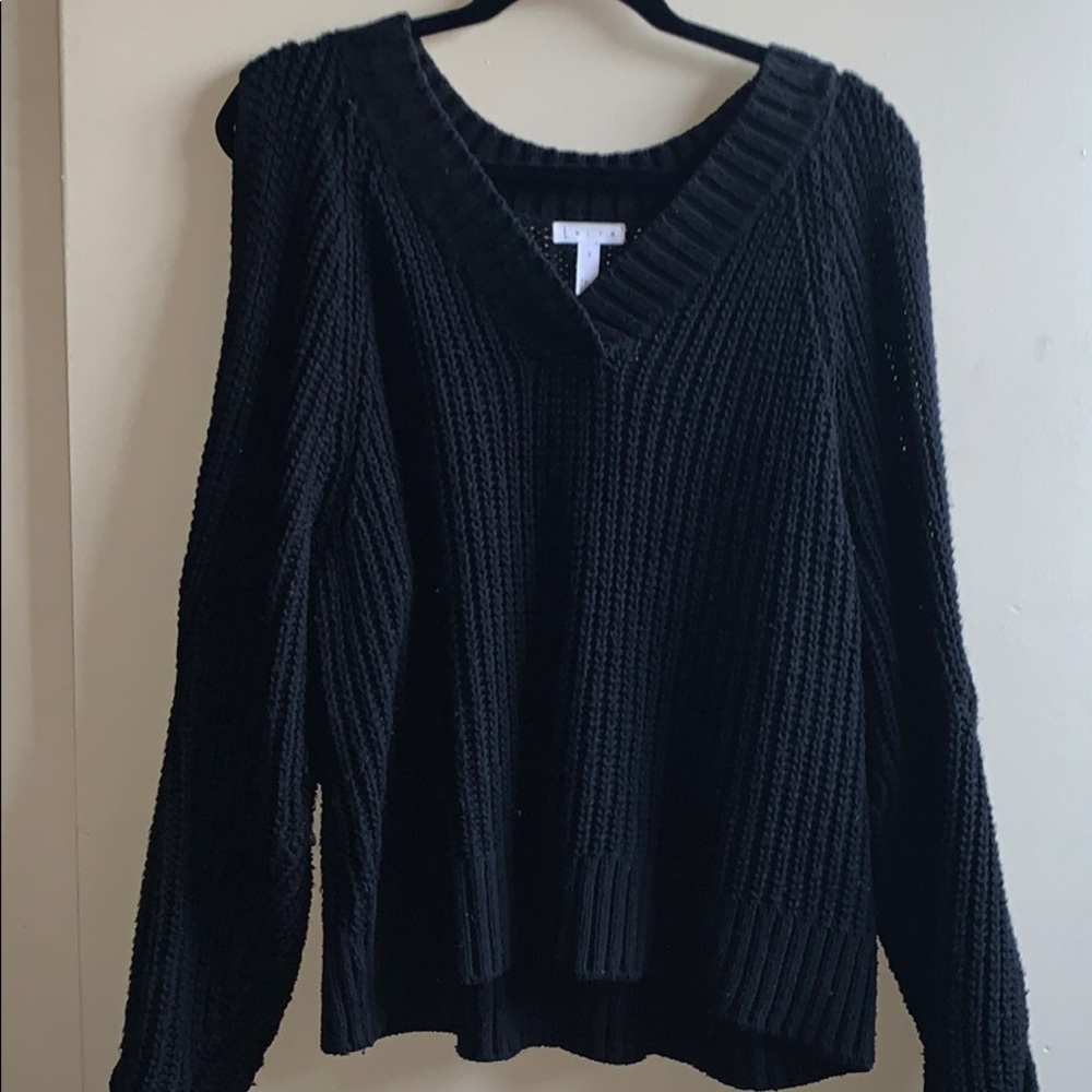 Black sweater with arm slits